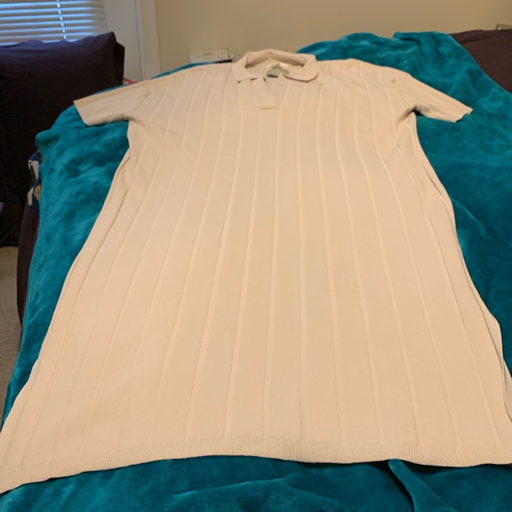 Beige pleated dress.